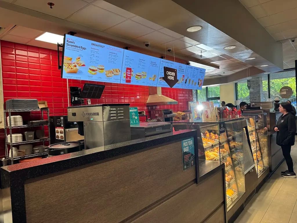 Tim Hortons storefront and interior at 100 Gopher St, Banff, AB
