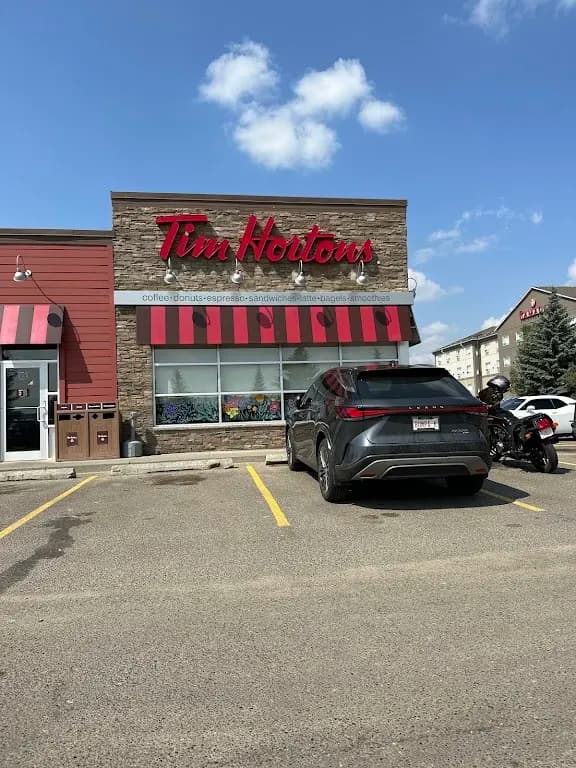 Tim Hortons storefront and interior at 1315 2 St W, Brooks, AB