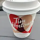 Tim Hortons storefront and interior at 151 Copperpond Blvd Se, Calgary, AB