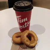 Tim Hortons storefront and interior at 225 7th Ave Sw, Calgary, AB