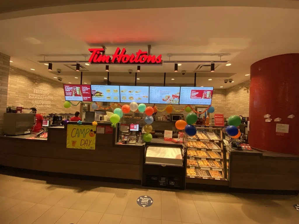 Tim Hortons storefront and interior at 520 3 Avenue Sw, Calgary, AB