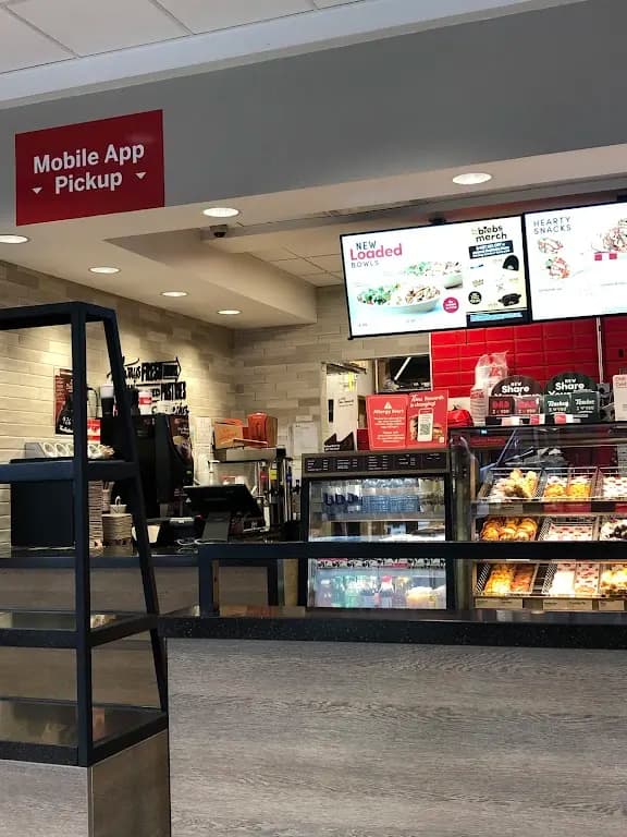 Tim Hortons storefront and interior at 665 8th St Sw, Calgary, AB