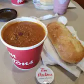 Tim Hortons storefront and interior at 2520 52 St Ne, Calgary, AB