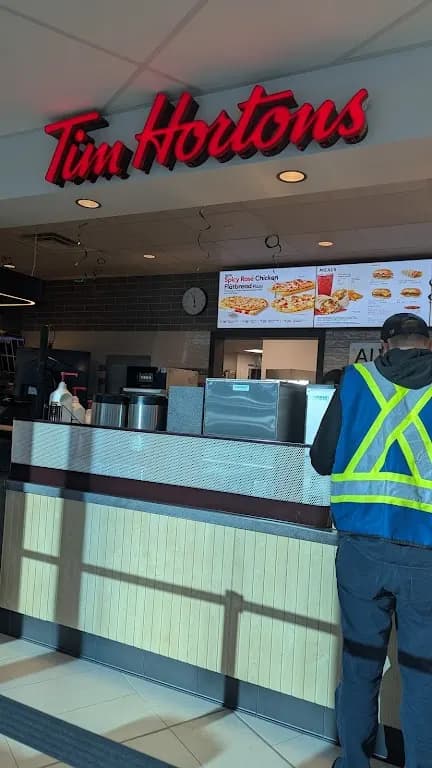 Tim Hortons storefront and interior at Arthur Je Child Comprehensive Cancer Centre, Calgary, AB