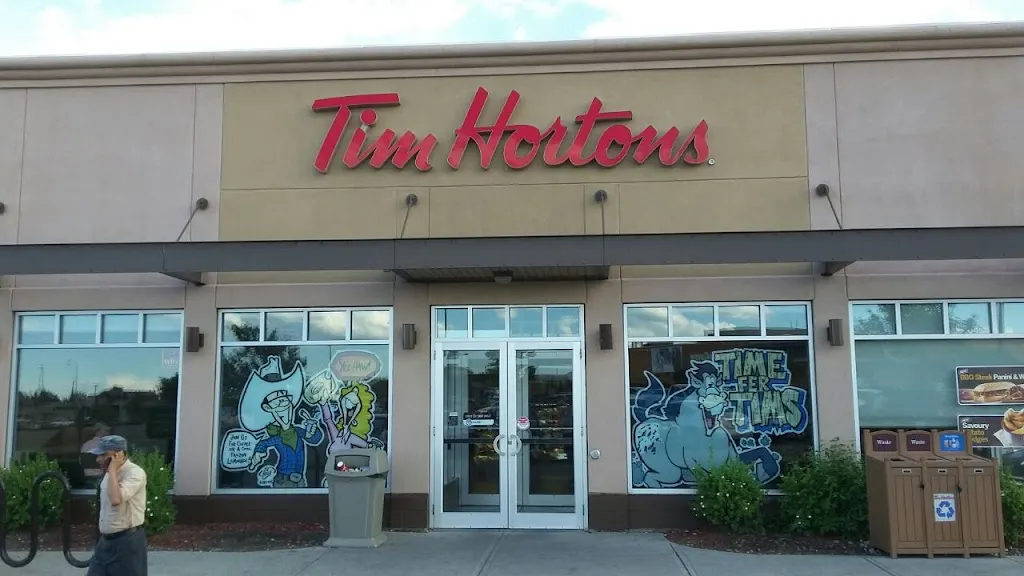 Tim Hortons storefront and interior at 3580 20 Ave Ne, Calgary, AB