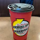 Tim Hortons storefront and interior at 4307 130th Ave Se, Calgary, AB
