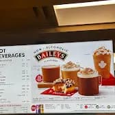 Tim Hortons storefront and interior at 4705 16th Ave Nw, Calgary, AB