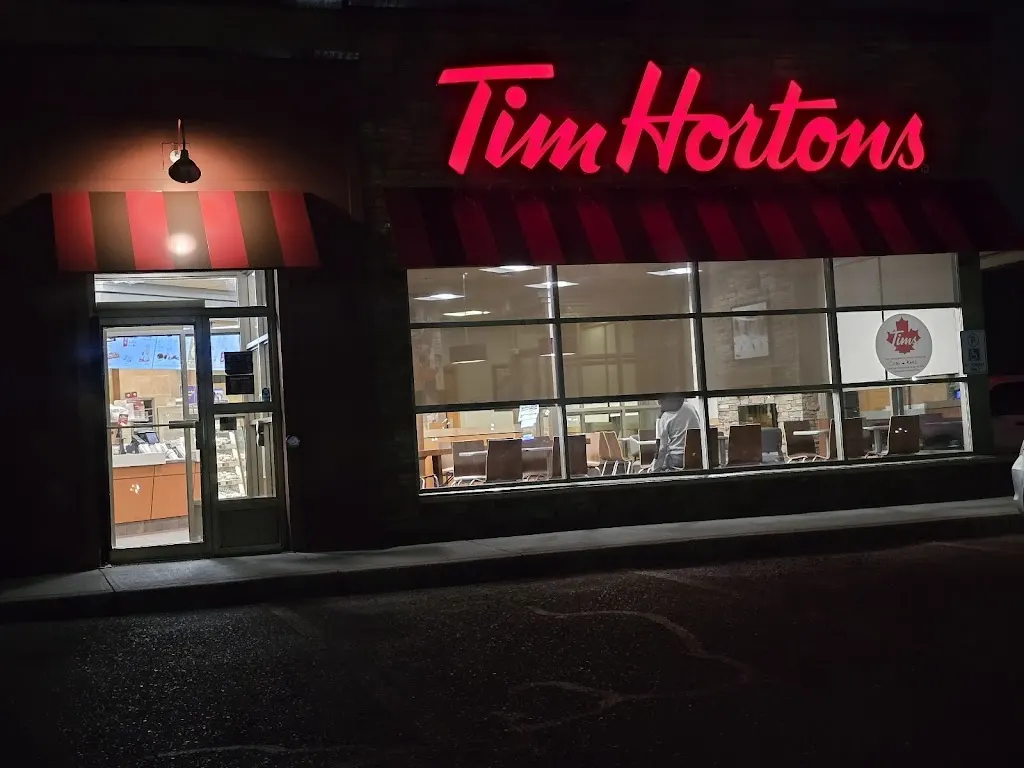 Tim Hortons storefront and interior at 5105 Falconridge Blvd Ne, Calgary, AB