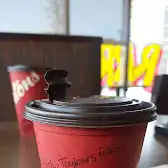 Tim Hortons storefront and interior at 5105 Falconridge Blvd Ne, Calgary, AB
