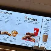 Tim Hortons storefront and interior at 7170 80th Avenue Ne, Calgary, AB