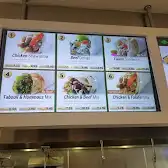 Tim Hortons storefront and interior at 8835 Macleod Trail Se, Calgary, AB