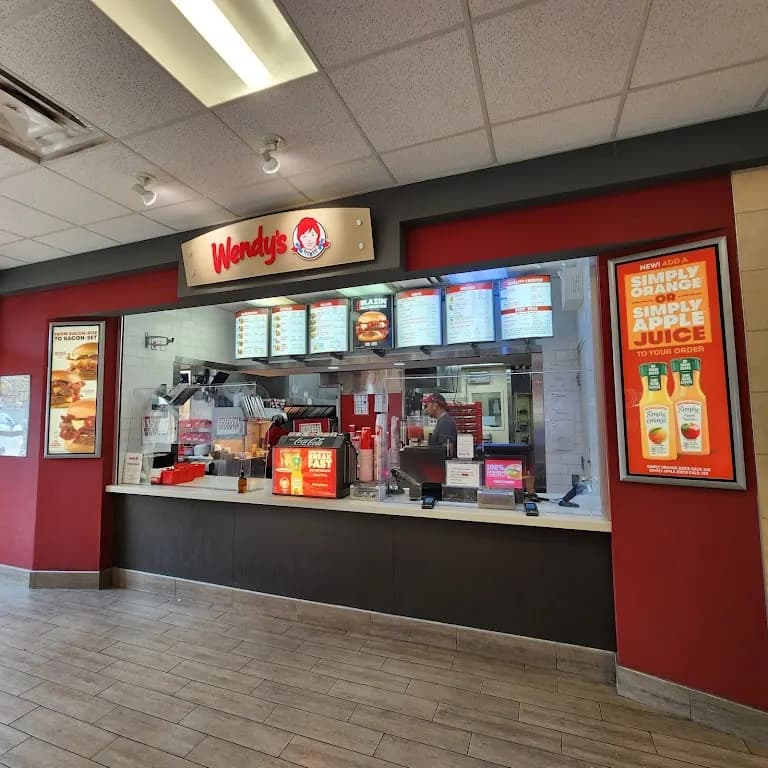 Tim Hortons storefront and interior at 1729 Mountain Ave, Canmore, AB