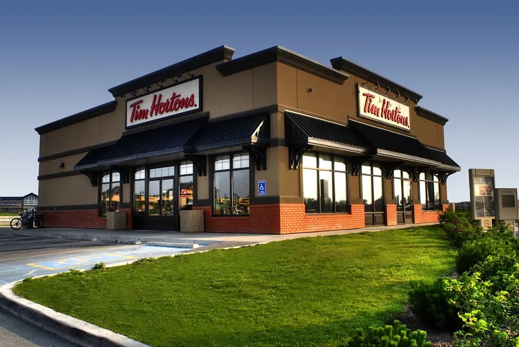 Tim Hortons storefront and interior at 120 Chestermere Station Way, Chestermere, AB