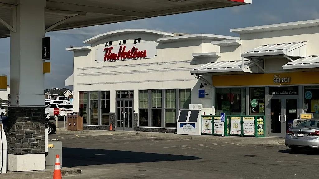 Tim Hortons storefront and interior at 12 Fireside Gate, Cochrane, AB