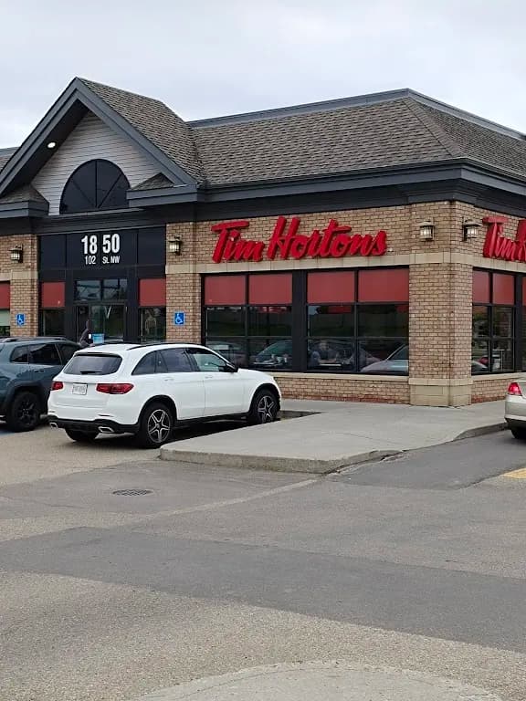 Tim Hortons storefront and interior at 1850 102 St Nw, Edmonton, AB