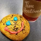 Tim Hortons storefront and interior at 7457 Roper Rd Nw, Edmonton, AB