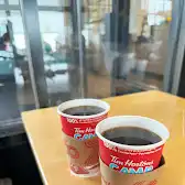 Tim Hortons storefront and interior at 8555 Argyll Rd Nw, Edmonton, AB