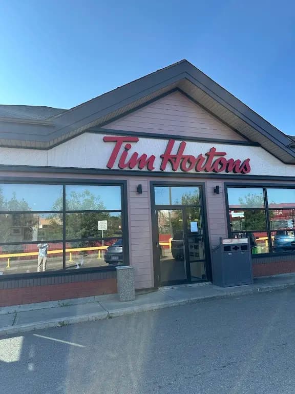 Tim Hortons storefront and interior at 4924 46th St, Lacombe, AB