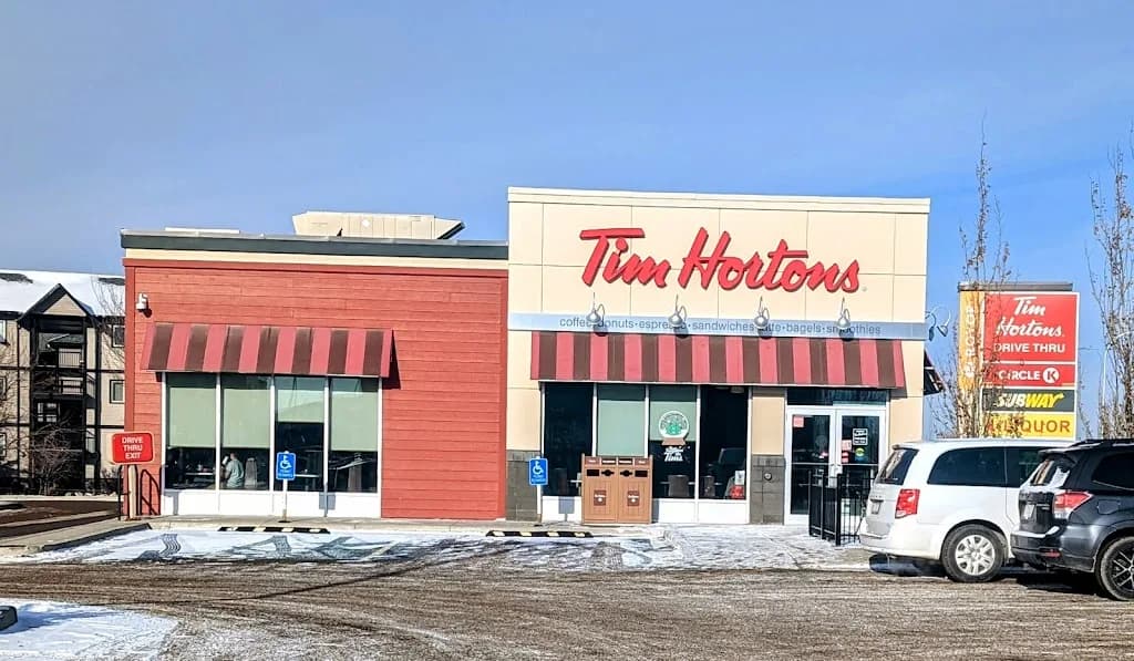 Tim Hortons storefront and interior at 115 Sunridge Road West, Lethbridge, AB