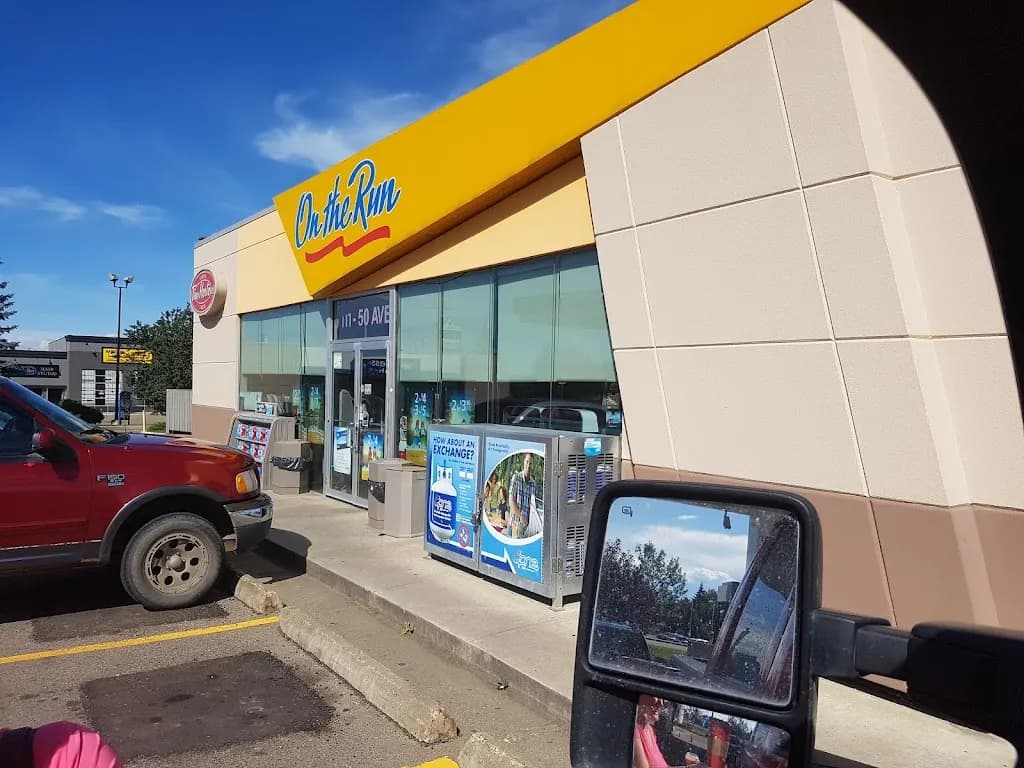 Tim Hortons storefront and interior at 7111 50th Ave, Red Deer, AB