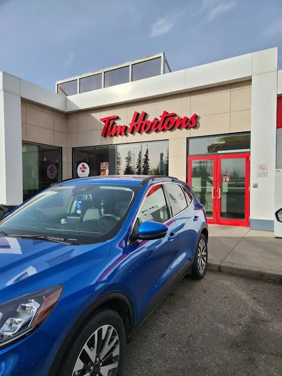 Tim Hortons storefront and interior at 310 Ridge Rd, Strathmore, AB
