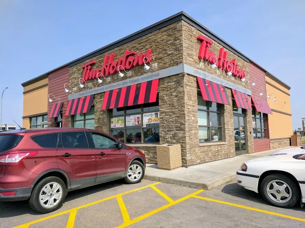 Tim Hortons storefront and interior at 2710 13th Ave, Wainwright, AB