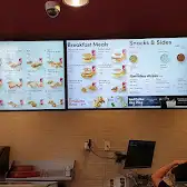 Tim Hortons storefront and interior at 463 Robson St, Vancouver, BC
