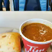 Tim Hortons storefront and interior at 5896 Fraser St, Vancouver, BC