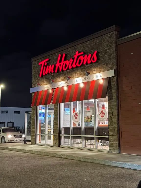 Tim Hortons storefront and interior at 11 Davis Way, Rosser, MB