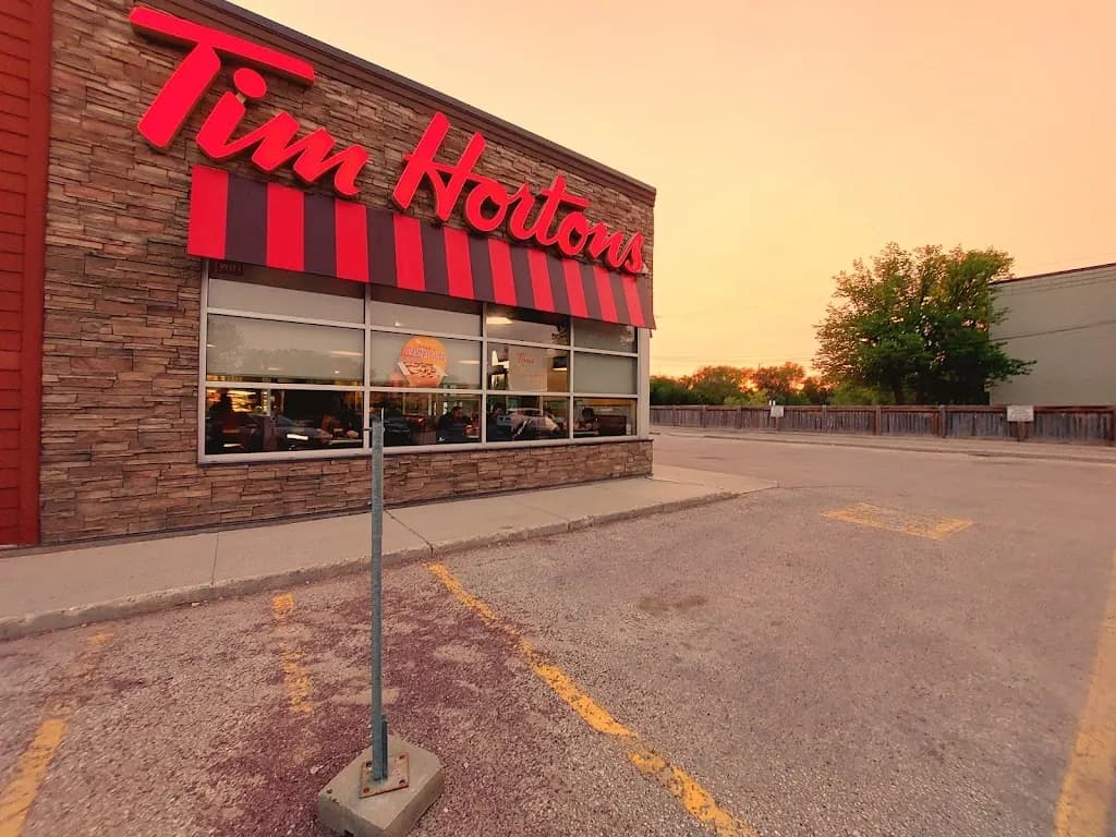 Tim Hortons storefront and interior at 240 Graham Ave, Winnipeg, MB