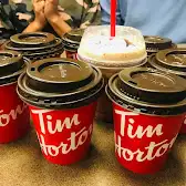 Tim Hortons storefront and interior at 3649 Portage Ave, Winnipeg, MB