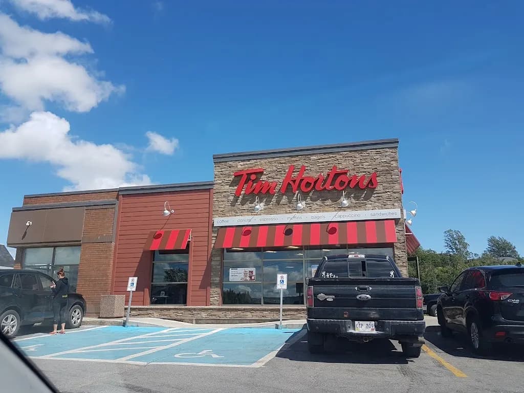 Tim Hortons storefront and interior at 12 Commerce St, Deer Lake, NL