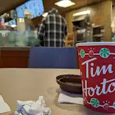 Tim Hortons storefront and interior at 6046 Young St, Halifax, NS