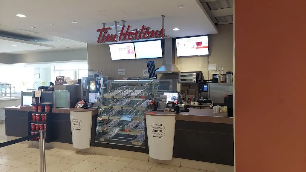 Tim Hortons storefront and interior at 333 First Commerce Dr, Aurora, ON