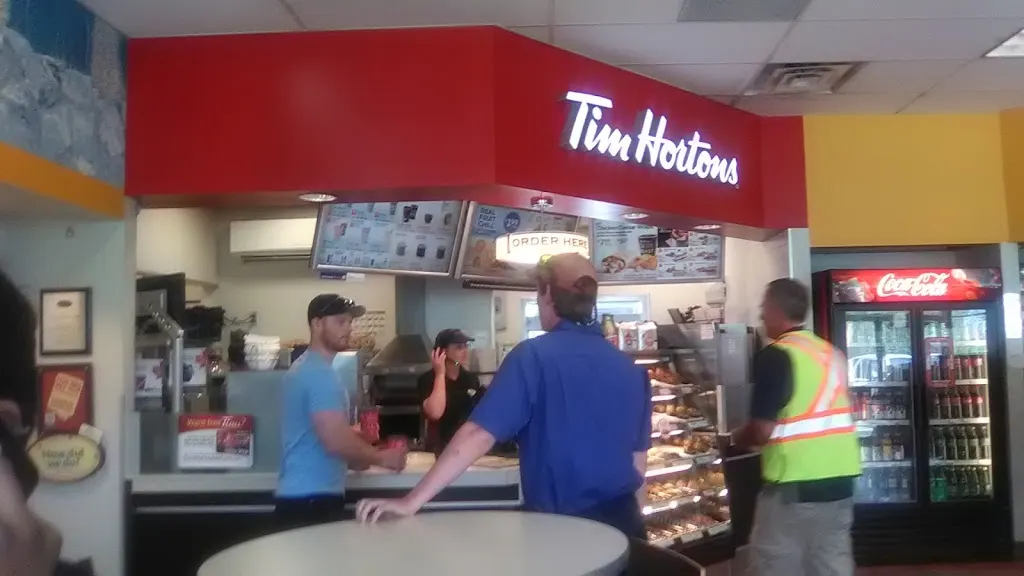 Tim Hortons storefront and interior at 99 Mapleview Dr East, Barrie, ON