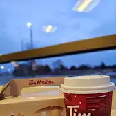 Tim Hortons storefront and interior at 218 Bell Blvd, Belleville, ON