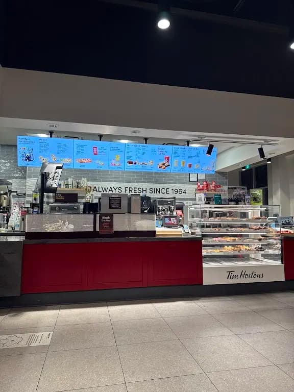 Tim Hortons storefront and interior at 5 Ashby Field Dr, Brampton, ON