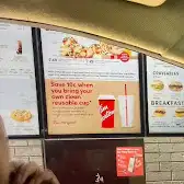 Tim Hortons storefront and interior at 152 West Dr, Brampton, ON