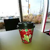 Tim Hortons storefront and interior at 330 Main St N, Brampton, ON