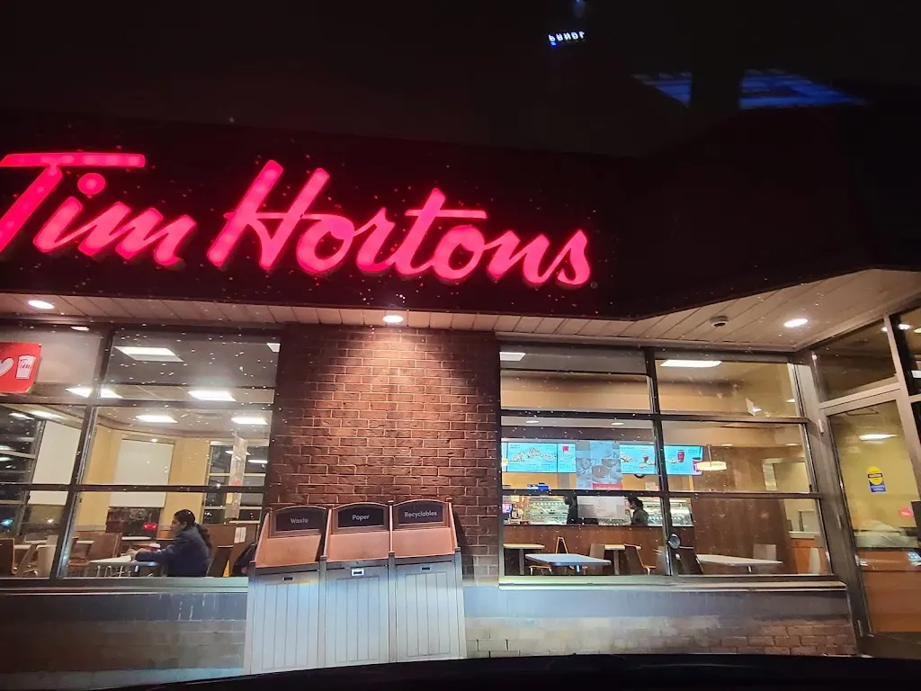 Tim Hortons storefront and interior at 1150 Steeles Ave, Brampton, ON