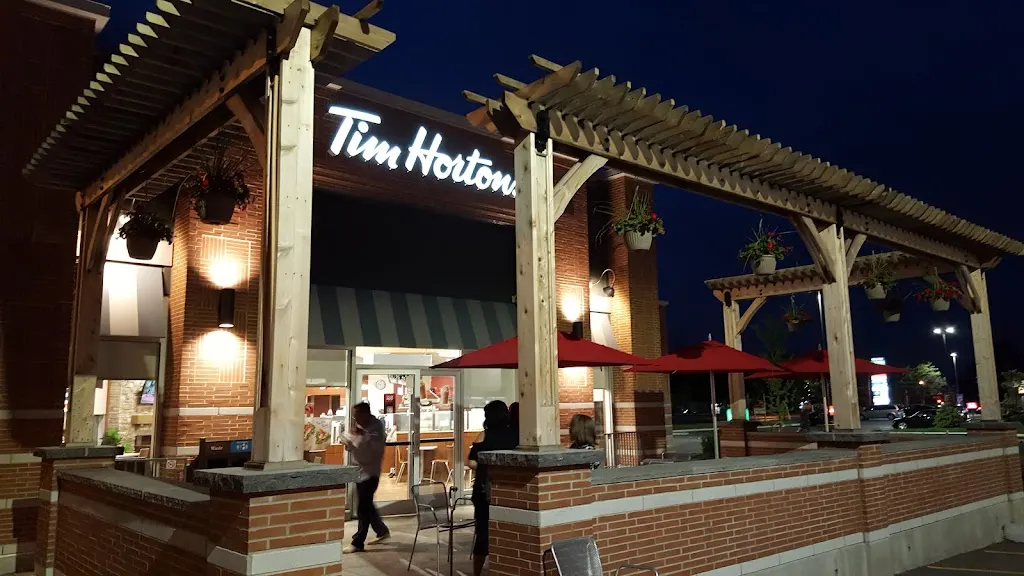 Tim Hortons storefront and interior at 9990 Mcvean Dr, Brampton, ON