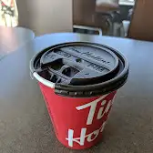 Tim Hortons storefront and interior at 648 Colborne St, Brantford, ON