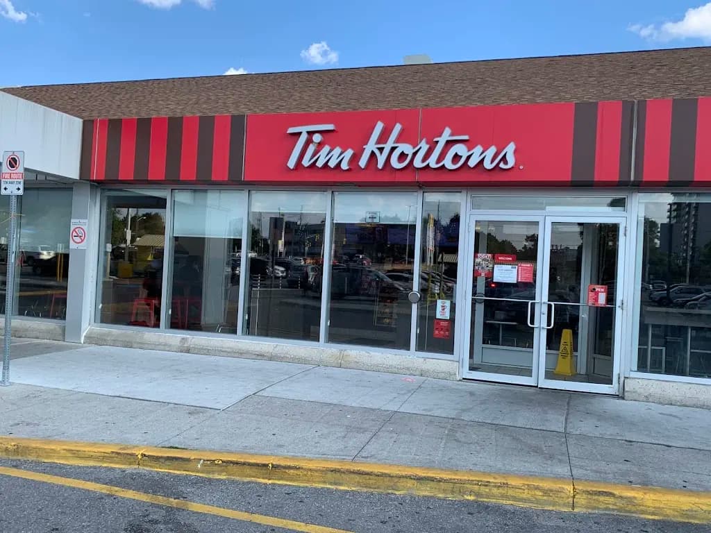 Tim Hortons storefront and interior at 245 Dixon Rd, Etobicoke, ON