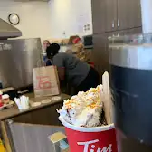 Tim Hortons storefront and interior at 245 Dixon Rd, Etobicoke, ON