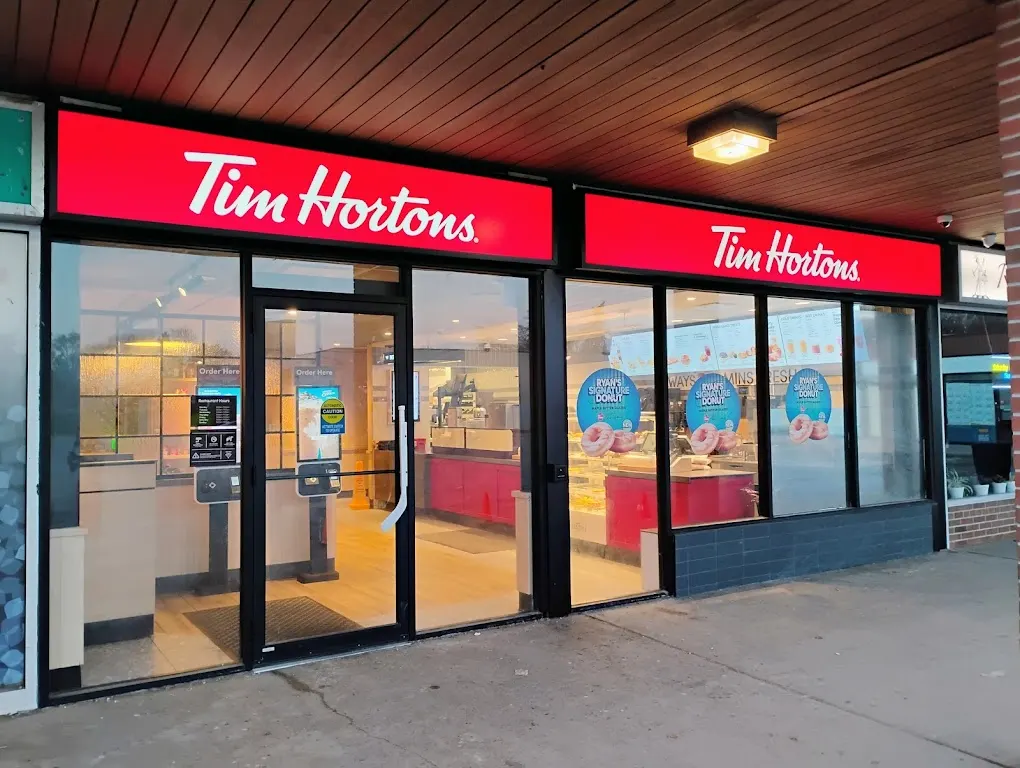 Tim Hortons storefront and interior at 250 - Wincott Dr, Etobicoke, ON