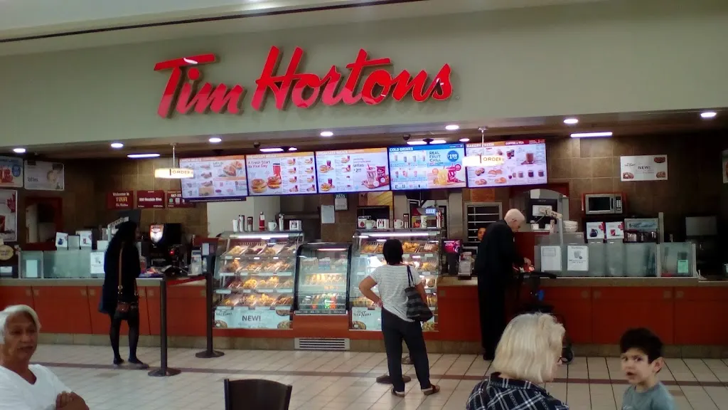 Tim Hortons storefront and interior at 500 Rexdale Blvd, Etobicoke, ON