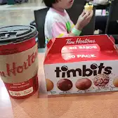Tim Hortons storefront and interior at 500 Rexdale Blvd, Etobicoke, ON