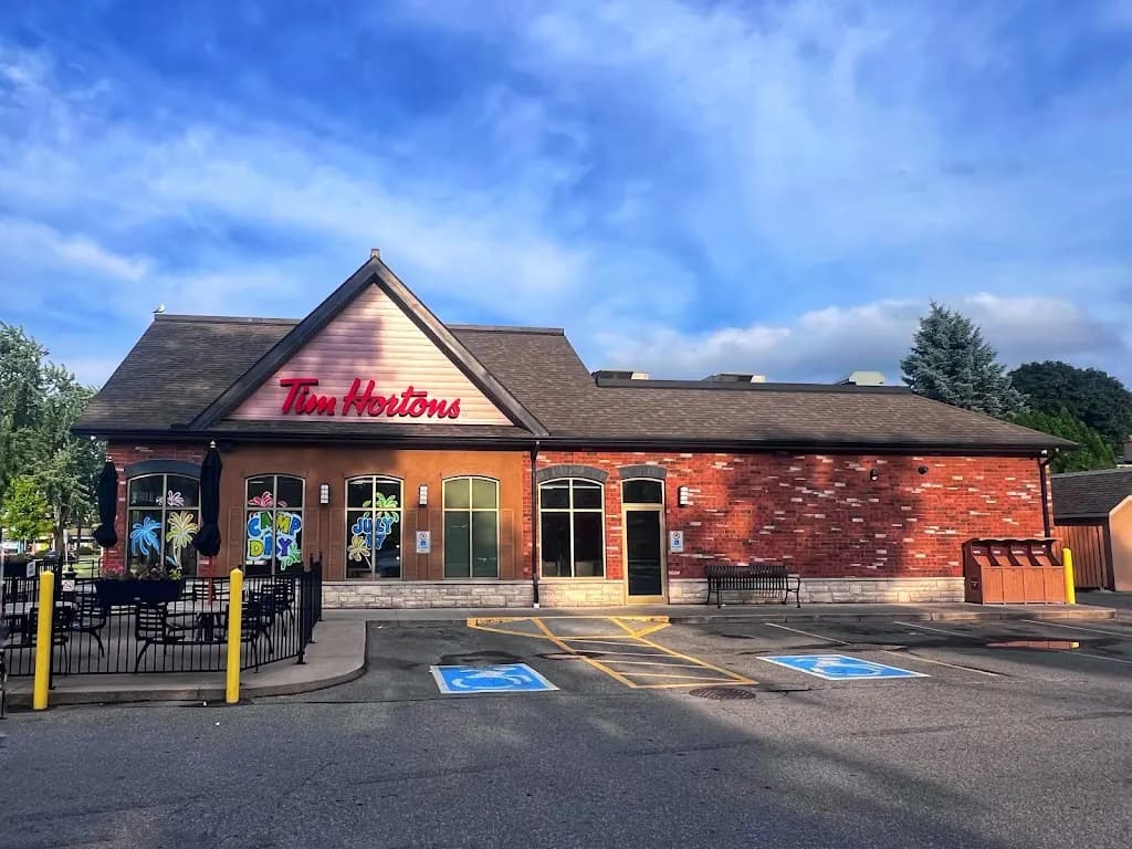 Tim Hortons storefront and interior at 142 Main St East, Grimsby, ON