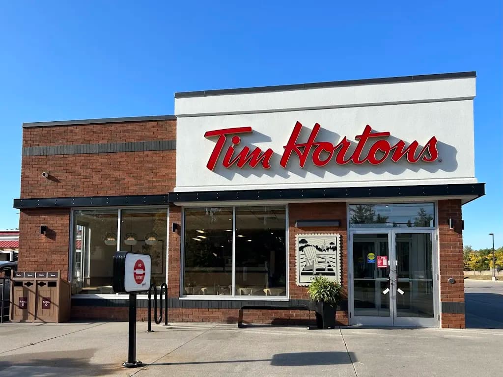 Tim Hortons storefront and interior at 698 Woolwich St, Guelph, ON
