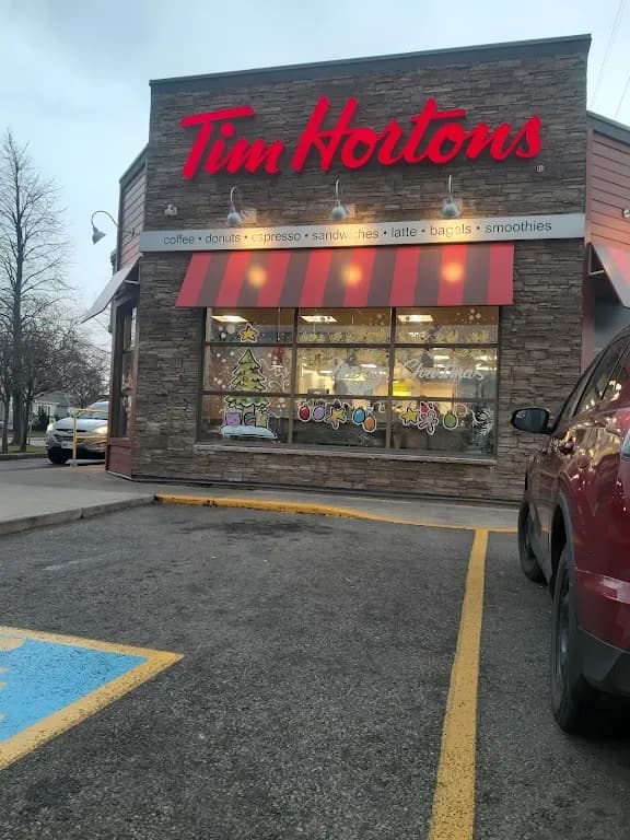 Tim Hortons storefront and interior at 30 Queenston Rd, Hamilton, ON